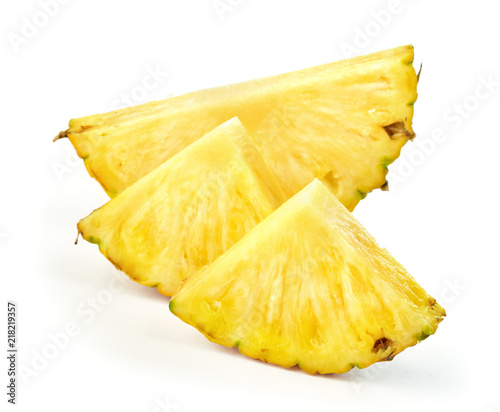slices of pineapple fruit isolated on white background