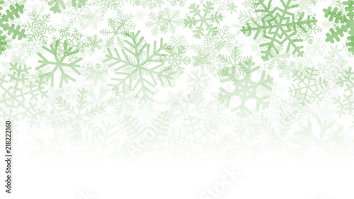 Christmas background of many layers of snowflakes of different shapes, sizes and transparency. Gradient from green to white