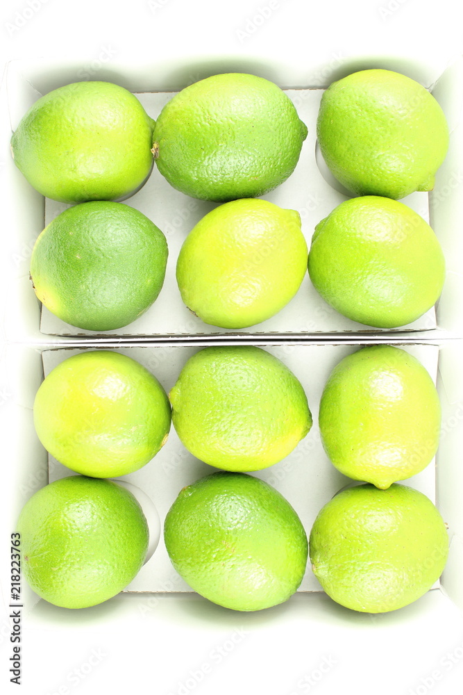 fresh lime fruits in boxes
