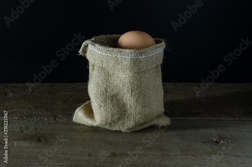 egg in sack on the cloth floor