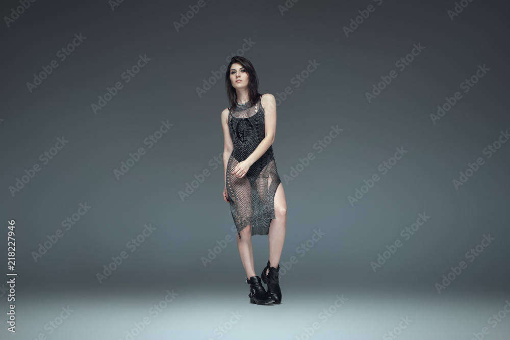 Two fashionable girls wearing black trendy outfits posing Two fashionable girls wearing black trendy outfits posing