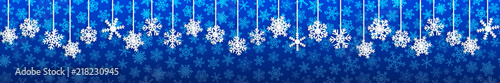 Christmas seamless banner with white hanging snowflakes with shadows on blue background