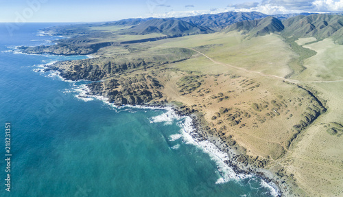 An aerial view of Llanos de Challe National Park, Atacama Desert at the coast area. Amazing landscape like this coastline of the Pacific Ocean at Carrizal Bajo town with it gorges and valleys, Chile
