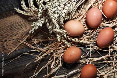 Egg. Fresh farm eggs on a wooden rustic background