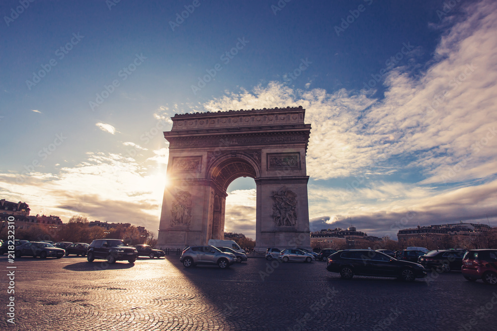 Triumphal arch or Arc de triomphe de l'Étoil. View Place Charles de Gaulle. Famous touristic architecture landmark in Paris, France.Napoleon victory monument. Symbol of french glory. World historical 