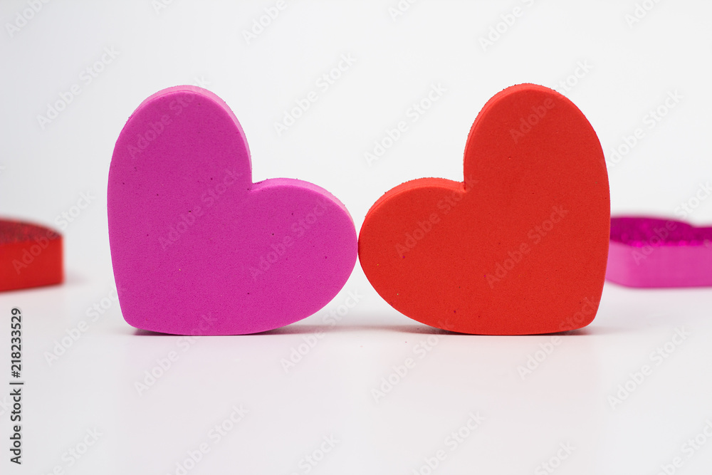 Fototapeta premium Red and pink Hearts on white background