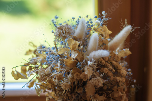 beautiful and delicate bouquet of dried flowers © klavdiyav