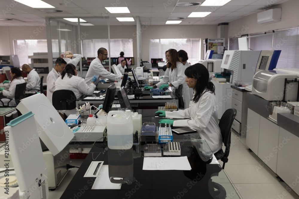 Team of laboratory technicians working in blood bank Team of laboratory technicians working in blood bank