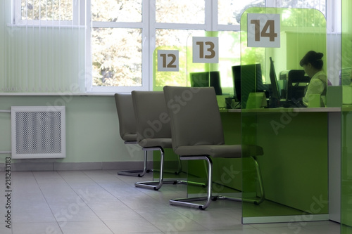 Cozy office green. Chairs for visitors, and empty seats. © Deboro