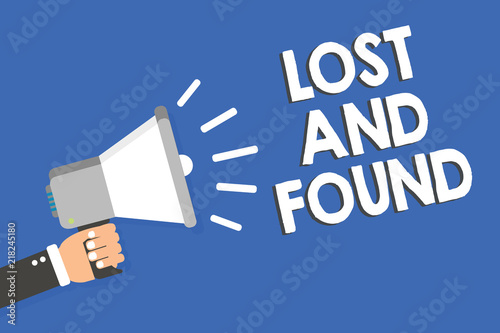 Text sign showing Lost And Found. Conceptual photo Place where you can find forgotten things Search service Man holding megaphone loudspeaker blue background message speaking loud.