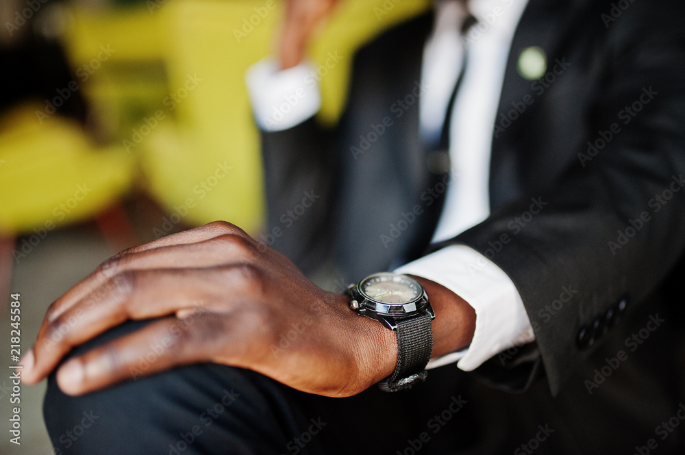 Close up hand of african american business man with watches. Close up hand of african american business man with watches.