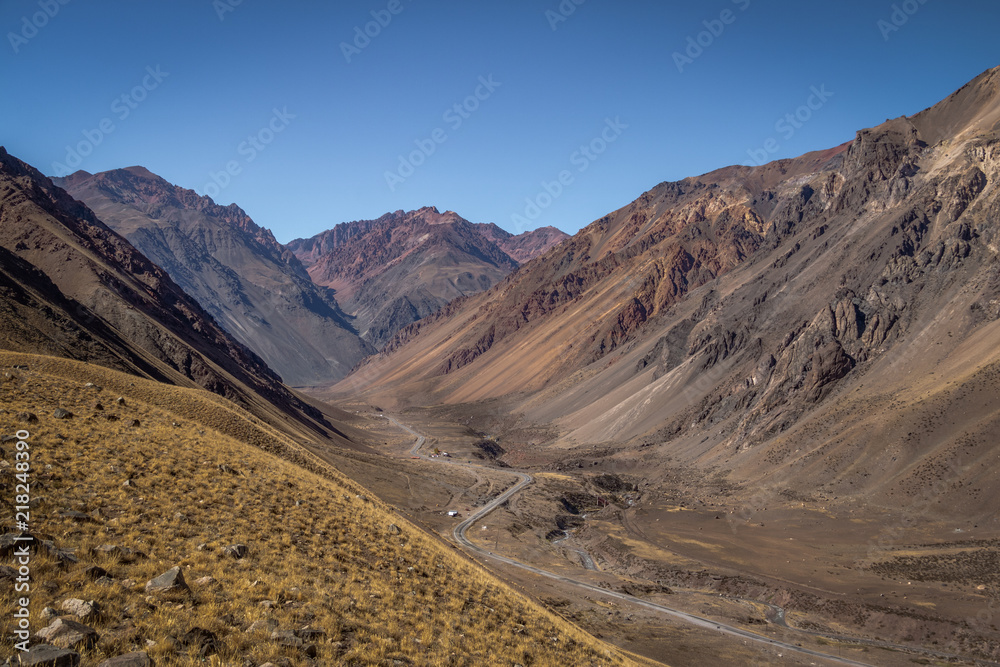 Mountains and road near Los Penitentes at Cordillera de Los Andes - Mendoza Province, Argentina.