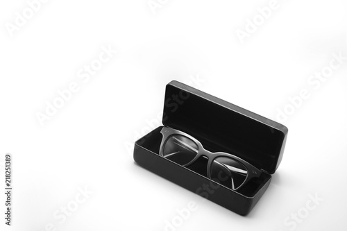 Sunglasses in a case, leather box packaging white isolated background