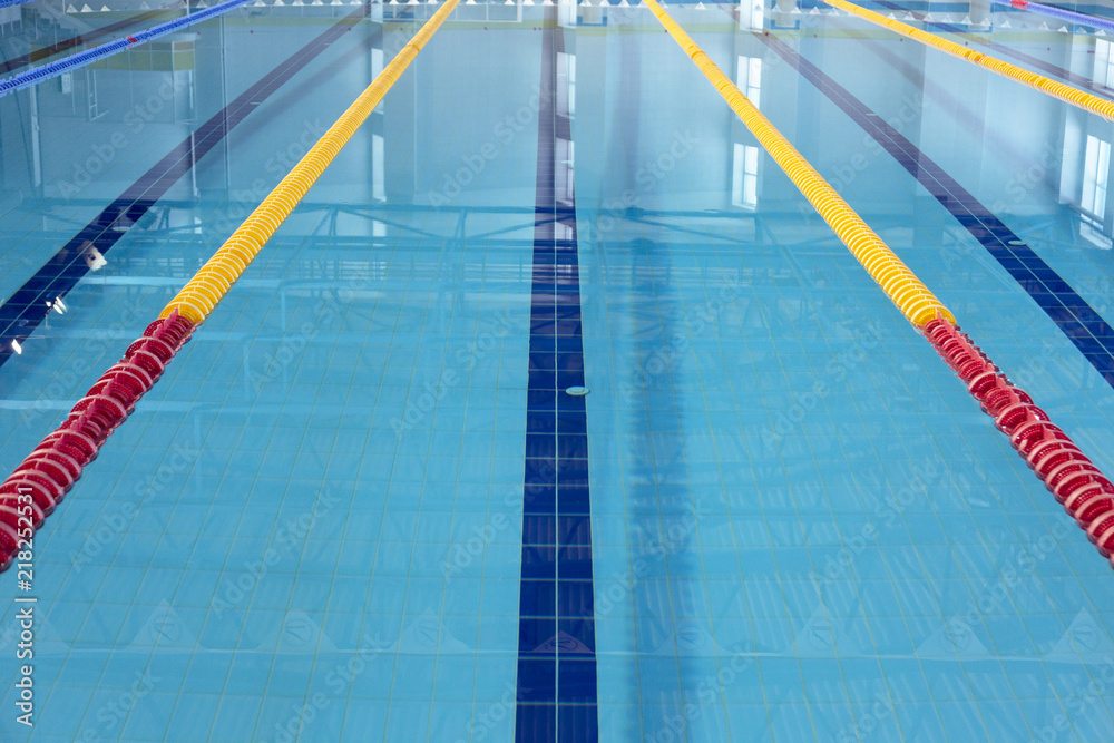Fototapeta premium Row of starting blocks in a swimming pool
