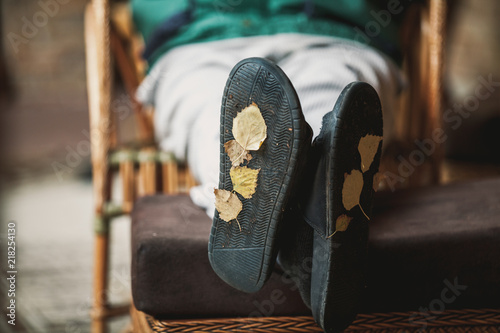 Yellow leaves on soles of room slippers