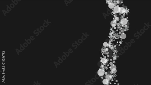 New year background with white frosty snowflakes. Horizontal snowfall backdrop. Winter new year background for holiday banners, cards. Falling snow with bokeh and flakes for special offers and sales.