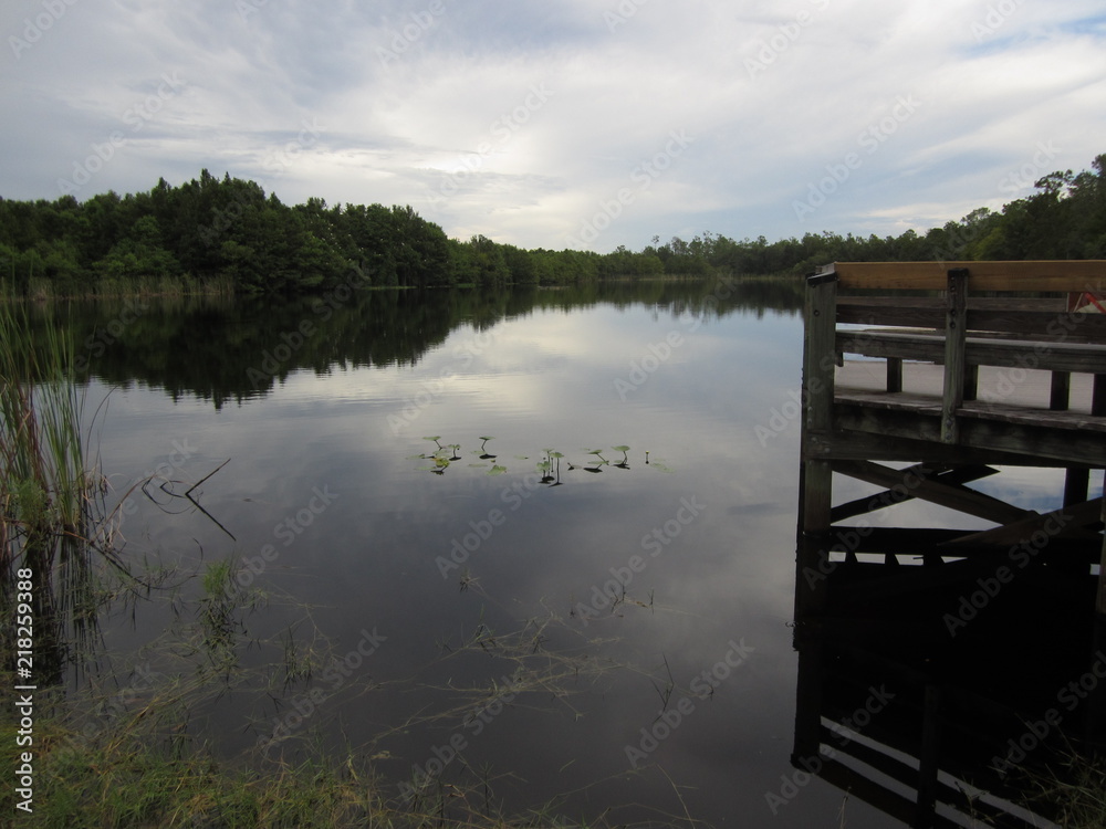 Still lake with empty platform