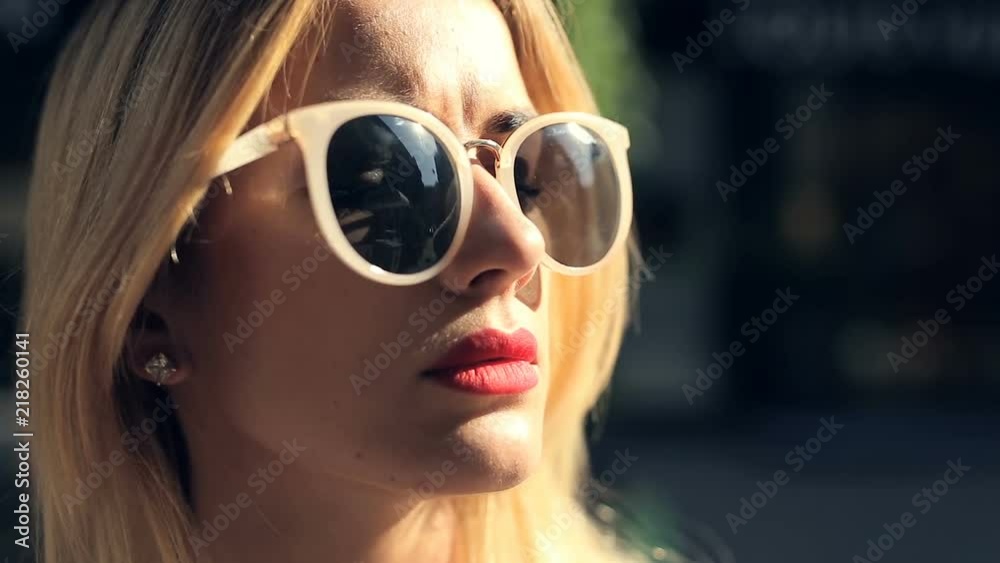Close up portrait of attractive blonde woman drinking coffee at the street. Close up portrait of attractive blonde woman drinking coffee at the street.