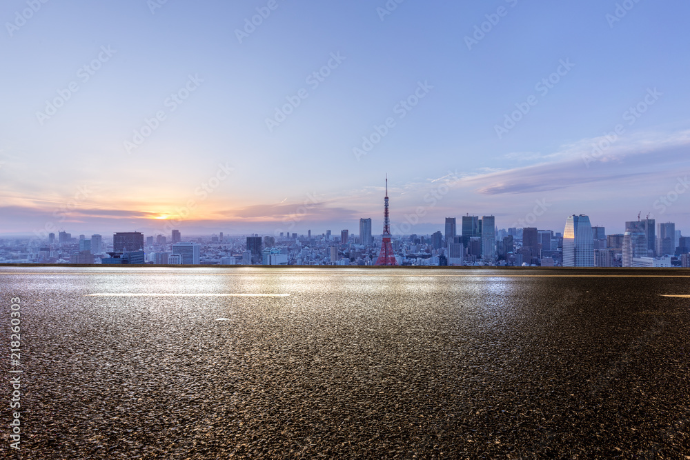 empty asphalt road with city skyline in japan