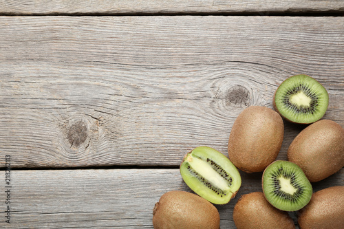 Kiwi fruits on grey wooden table