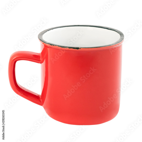 Red enamel mug isolated on white background