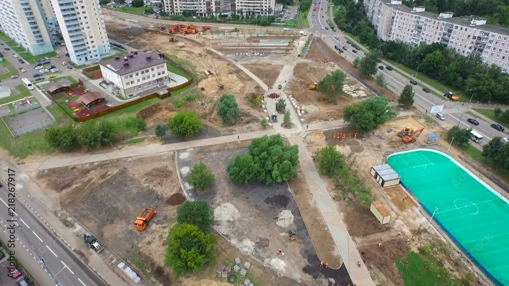 Repair of residential area of the city with a playground. Aligning the ground for the road. Repair of residential area of the city with a playground. Aligning the ground for the road.