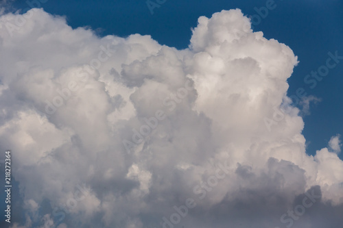 Blue sky background with clouds in summer day