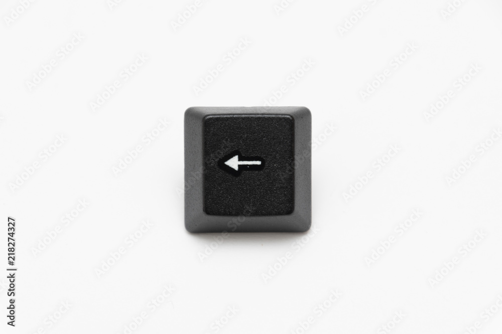 Single black keys of keyboard with different letters left arrow Single black keys of keyboard with different letters left arrow