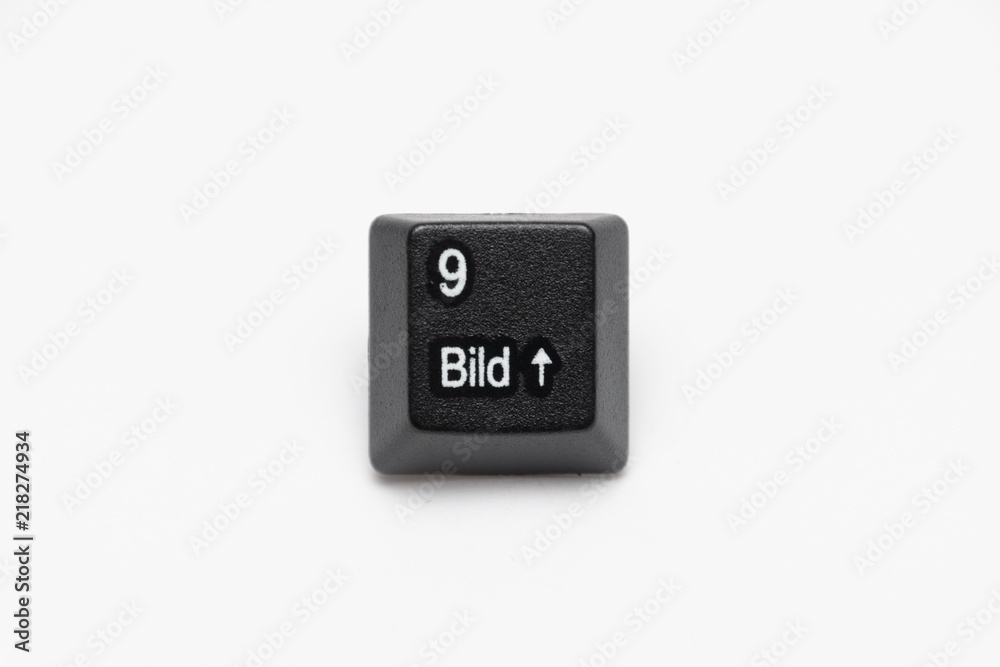 Single black keys of keyboard with different letters nine
