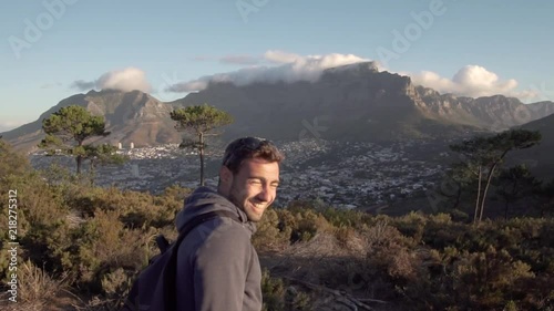 Friends clapping hands in Slow Motion with Table Mountain in the Background