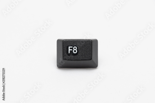 Single black keys of keyboard with different letters F8