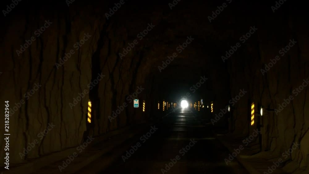 Driving out of tunnel in mountains in the Faroe Islands dramatic winter scene Driving out of tunnel in mountains in the Faroe Islands dramatic winter scene