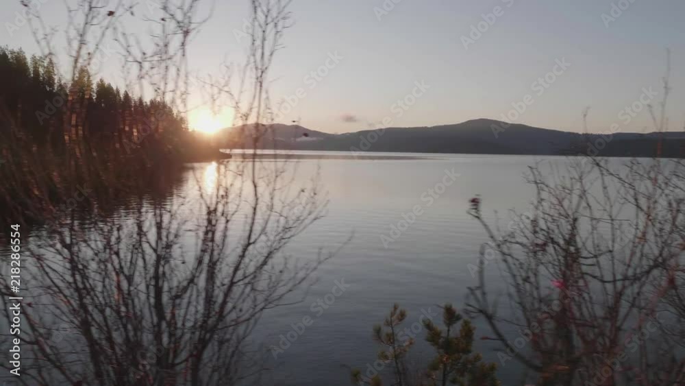 Beautiful morning hike around a lake at sunrise, with breathtaking views and a peaceful atmosphere. Beautiful morning hike around a lake at sunrise, with breathtaking views and a peaceful atmosphere.