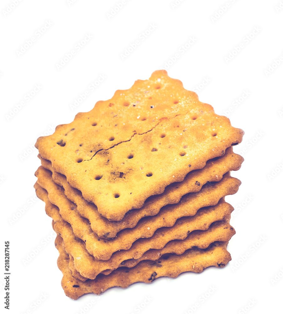 Fototapeta premium crackers or cookies on white