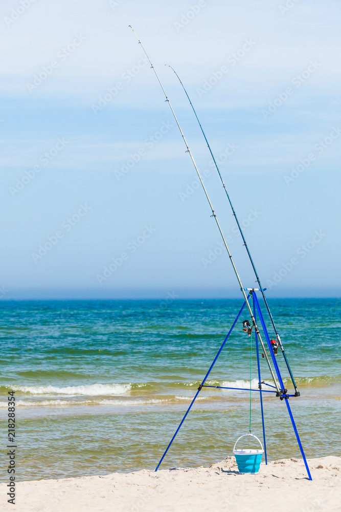Fishing rod left alone on sea shore