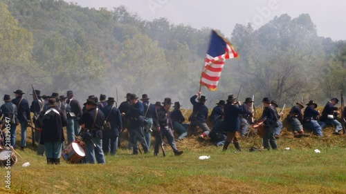 Union soldier waving a flag. photo