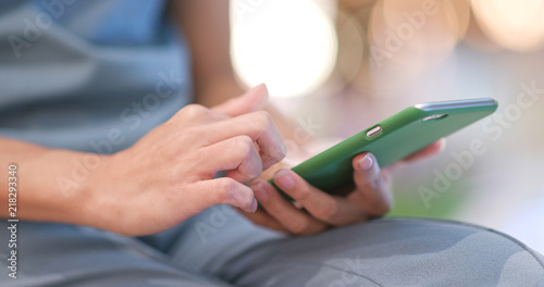 Close up of woman using mobile phone