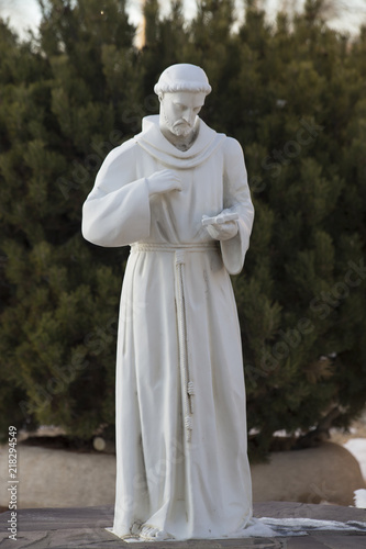Photography Statue of San Francisco De Asis in fornt of the Taos, New Mexico in front of his namesake church