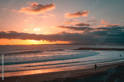 People walking at the beach sunset © ramoshots