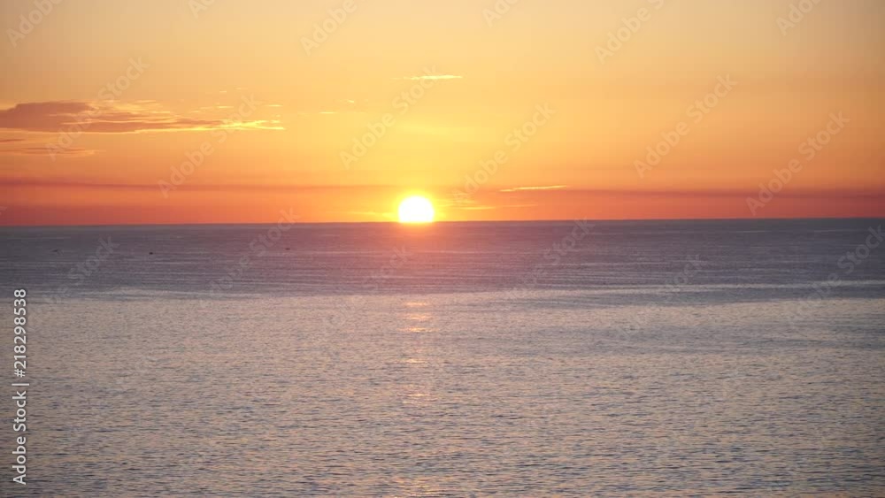 early morning sunrise over ocean from cliff top north curl curl beach sydney australia