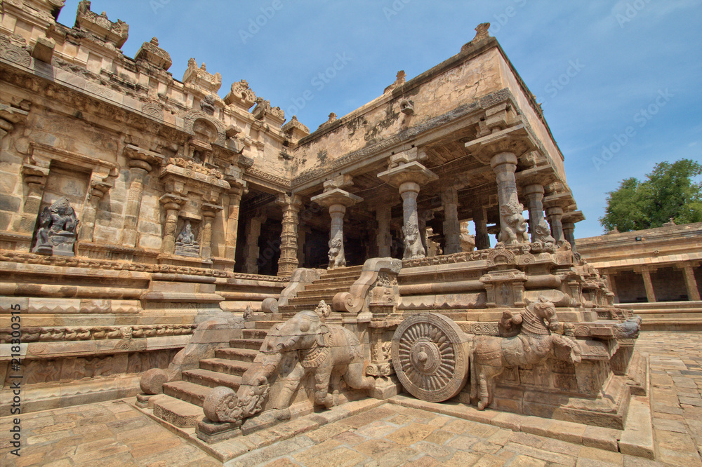 Airavatesvara, the stone temple incorporates a chariot structure, and includes major Vedic and Puranic deities such as Indra, Agni, Varuna, Vayu, Brahma, Surya, Vishnu, Saptamtrikas, 