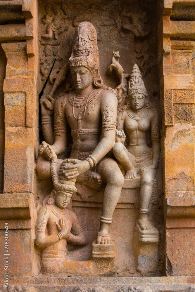 Sculpture od lord Shiva and Parvathy on exterior wall of 11th century Shiva  temple at Gangaikonda cholapuram, Tamilnadu, India Stock Photo | Adobe Stock