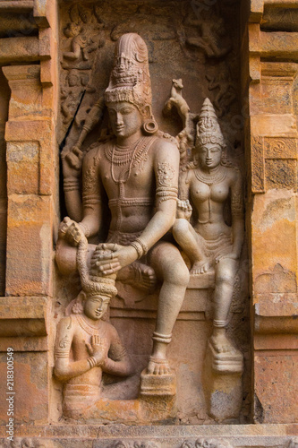  Sculpture  od lord Shiva and Parvathy on exterior wall of 11th century Shiva temple at Gangaikonda cholapuram, Tamilnadu, India © Syamkrs