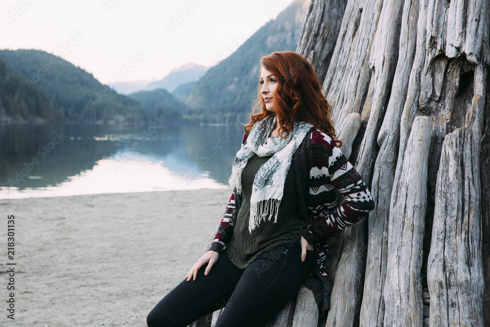 Redhead Student Hanging Out At The Park By The Lake