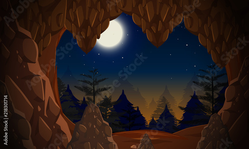 A cave entrance at night