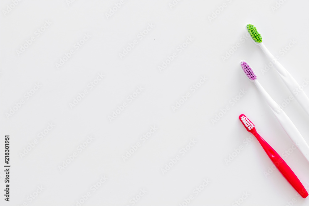 Clean teeth. Toothbrushes on white background top view copy space Clean teeth. Toothbrushes on white background top view copy space