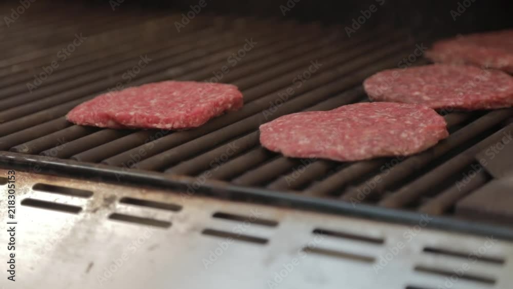 Placing Burger on Grill Slow Motion Placing Burger on Grill Slow Motion