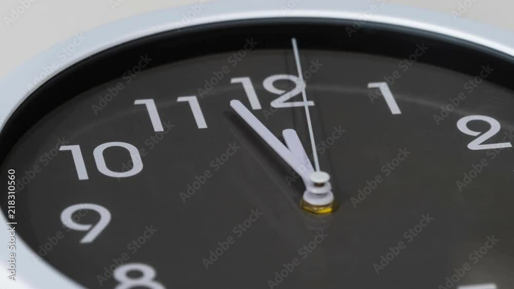 time lapse of clock showing at noon time lapse of clock showing at noon