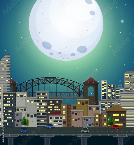 A giant full moon city scene