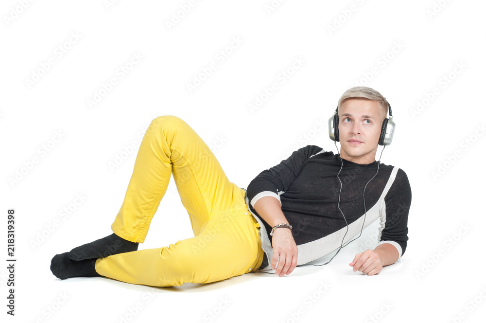Man in headphones lying down